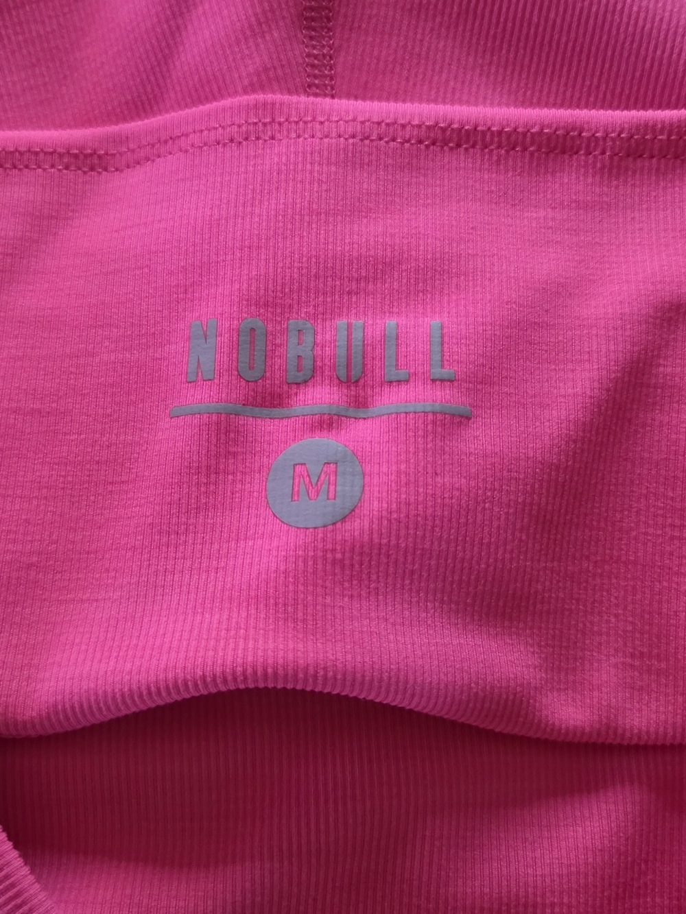 NOBULL Hot Pink Ribbed Performance Top with Reflective Logo - Picture 3 of 3